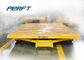 Yellow no - powered tow tailer for industrial assembly line with moving platform